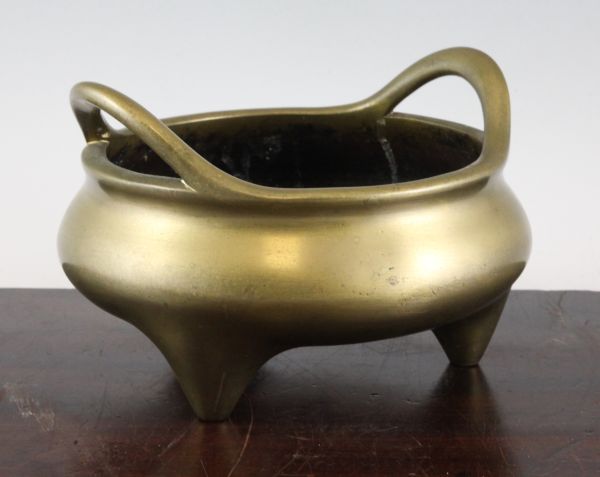 A large Chinese bronze ding shaped censer, Xuande six character mark, probably 18th century, 19.5cm., diam.13.3cm.